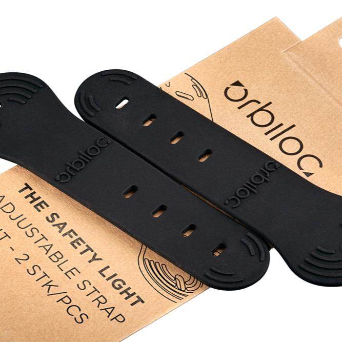 Adjustable Strap Kit für Orbiloc Safety Light – zwei verstellbare Silikonbänder zur sicheren Befestigung des Safety Lights an Gurten, Hundehalsbändern und anderen Trägern. Flexibel und langlebig.