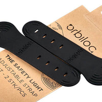 Adjustable Strap Kit für Orbiloc Safety Light – zwei verstellbare Silikonbänder zur sicheren Befestigung des Safety Lights an Gurten, Hundehalsbändern und anderen Trägern. Flexibel und langlebig.