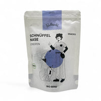 Bio-Rind-Snack-Streifen für Hunde mit 86% Rind aus Muskelfleisch, Herz, Lunge und Leber, angereichert mit Kokosmehl, Chiamehl und Flohsamen. Ohne künstliche Zusätze, mit Rosmarin und Meersalz als natürliche Konservierungsmittel.
