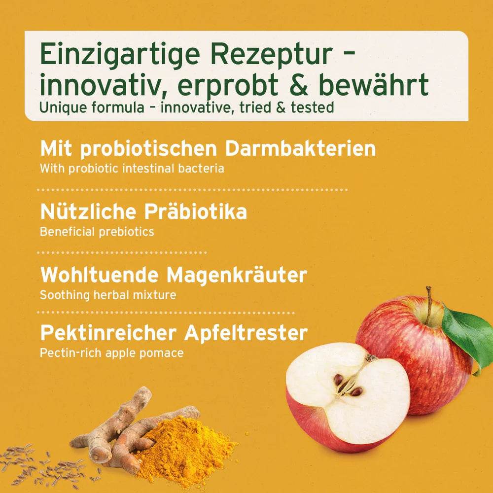 Das Bild zeigt eine einzigartige Rezeptur mit probiotischen Darmbakterien, nützlichen Präbiotika, wohltuenden Magenkräutern und pektinreichem Apfeltrester. Neben den Zutaten sind auch gelbe Gewürze und eine halbe Apfelfrucht sichtbar, die die natürlichen Inhaltsstoffe hervorheben.