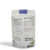 Etikett von Poodlewohl Bio-Hundesnack – enthält Informationen zu den Zutaten, Nährwerten und der biologischen Herkunft von Rind, Huhn, Karotte und Apfel.
