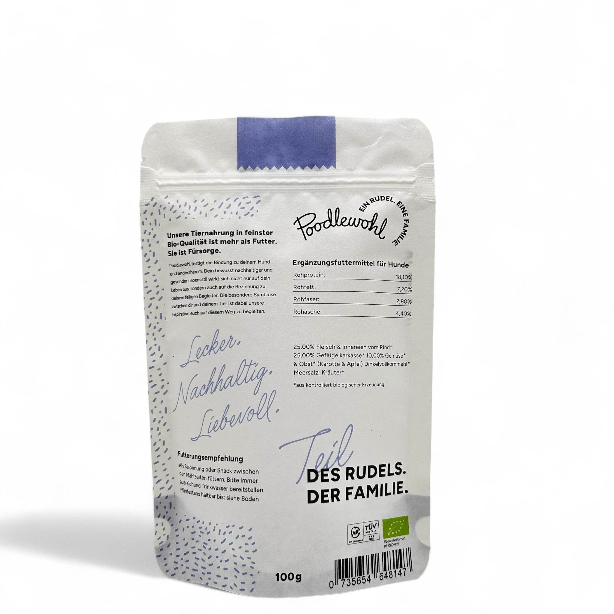 Etikett von Poodlewohl Bio-Hundesnack – enthält Informationen zu den Zutaten, Nährwerten und der biologischen Herkunft von Rind, Huhn, Karotte und Apfel.